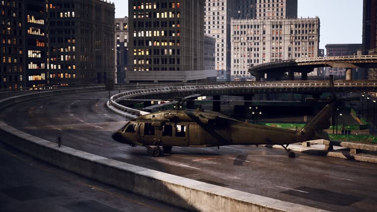 military helicopter in downtown at sunset