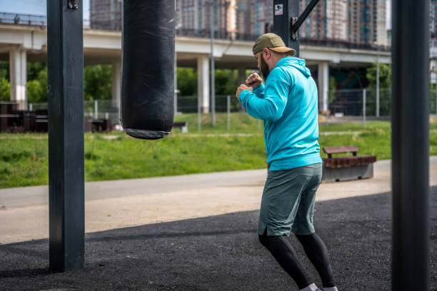 istock Boxing training at the outdoors sports ground 1497688160