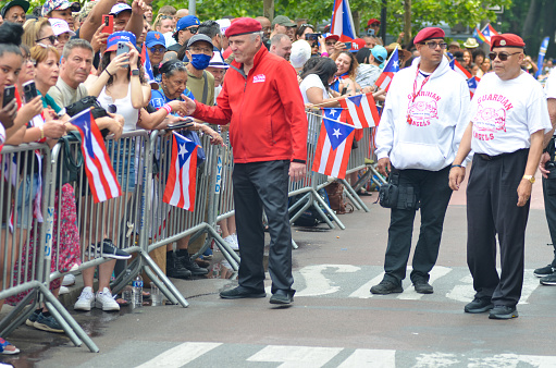 Politician Curtis Silwa is seen marching through Fifth Avenue, New York City during the 66th annual Puerto Rican Day Parade.
