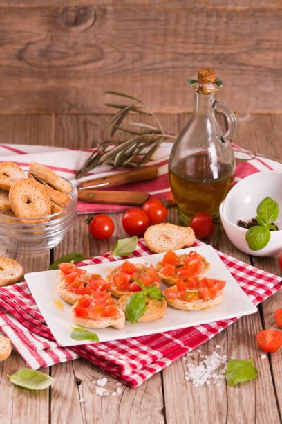 istock Friselle with cherry tomatoes and basil. 1497690239
