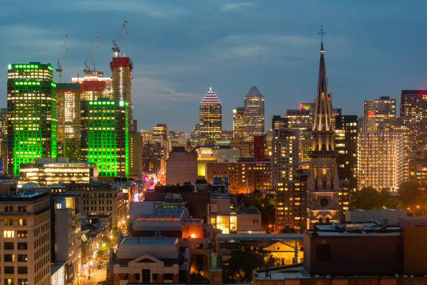 Montreal at dusk panorama with urban skyscrapers viewed from Mont Royal