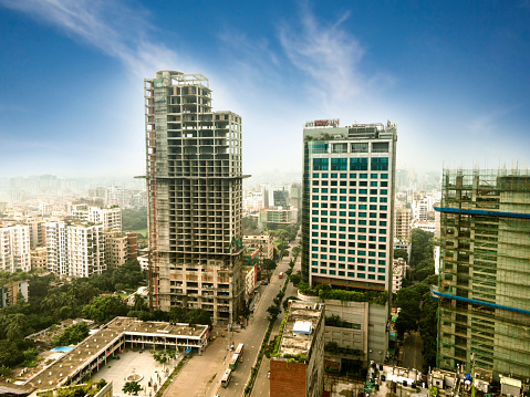 Aerial view of south Mumbai's skyline where old, heritage structures stand cheek by jowl with ultra modern skyscrapers and towers. The view covers and extends till luxurious Marine Drive, Nariman Point and Cuffe Parade with Arabian Sea in the distance