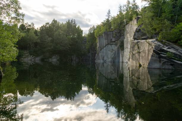 istock River, lake or the brook flowing in the wild nature. 1497700470