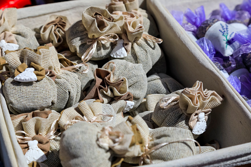 Nice, France - April 23, 2023: There is a group of sachets filled with dried lavender that have been put up for sale at the Cours Saleya market in Nice.