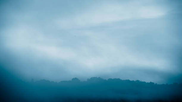 istock Fog over the hills, morning landscape. 1497702894