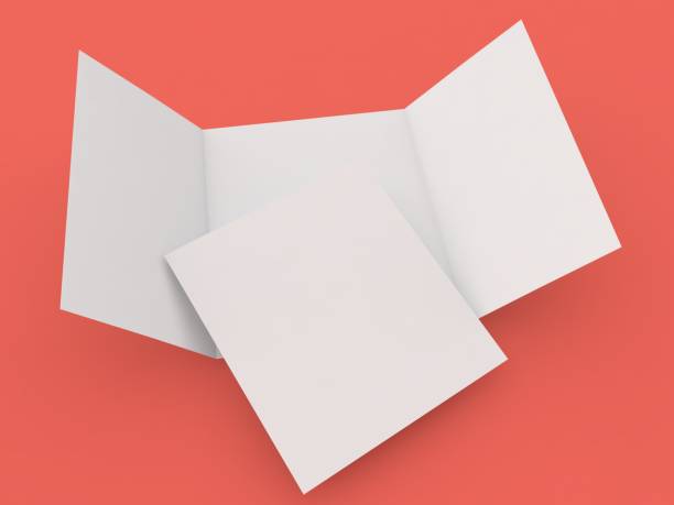 istock Open blank three folded flyer and A4 sheet mockup on red background. 1497704093