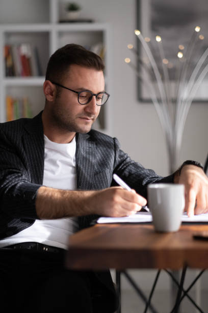 istock Handsome businessman working in Home office. 1497707349