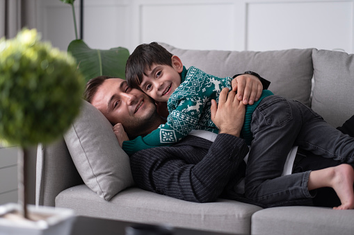 Loving dad with little son