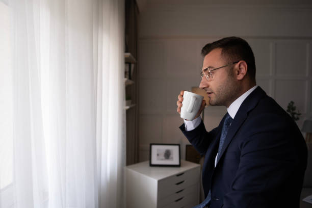 istock Thoughtful man enjoying a relaxing coffee 1497710894