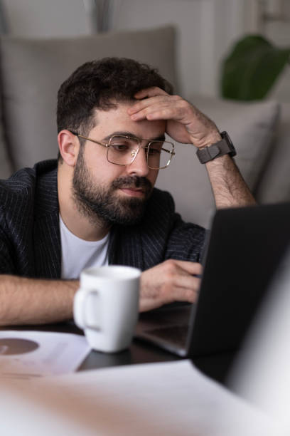 istock Handsome businessman working in Home office. 1497711467