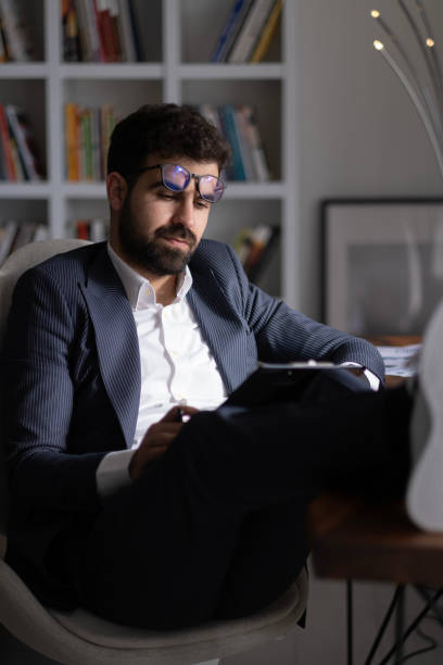 istock Handsome businessman working in Home office. 1497711569