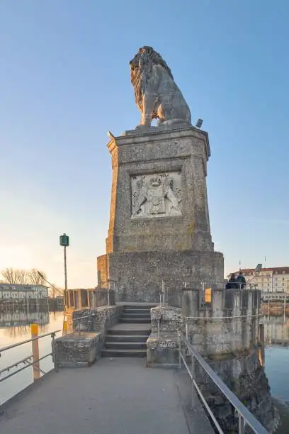 This stock photo depicts a the Bavarian lion in the harbor entrance of the island Lindau at the Lake constance in Bavaria, Germany