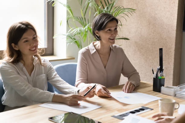 istock Office employees take part in group meeting in conference room 1497712444