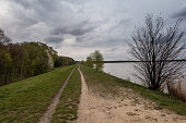 Dirt road on the embankment of the Kozlowa Gora water reservoir in Swierklaniec.