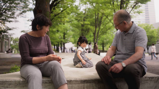 istock Grandparents enjoying playing with their granddaughter 1497716163