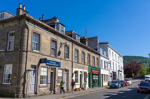 Dunkeld Scotland - May 30 2023: Businesses Along the Main Street in Dunkeld Scotland United Kingdom