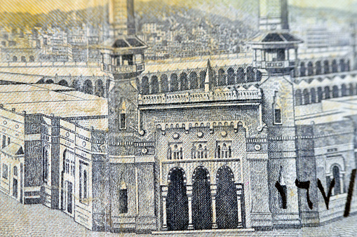 Al-Masjid al-Haram (Holy mosque), Mecca, Saudi Arabia from the obverse side of 10 SAR Saudi Arabia riyals cash money currency banknote, vintage retro old 10 riyals, selective focus