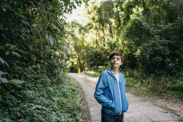 Teenage boy in nature park