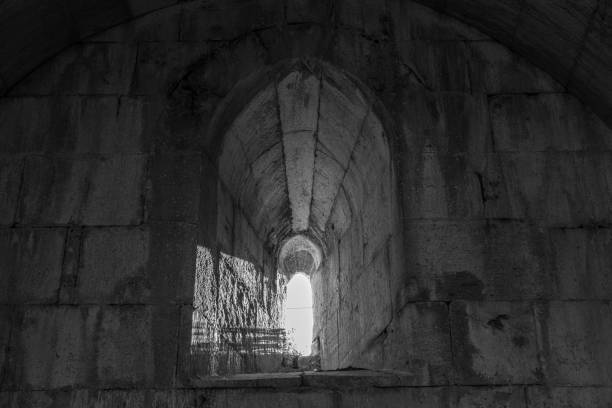 istock Incirhan Seljuk Caravanserai interior - Window and light - Black and white 1497727497