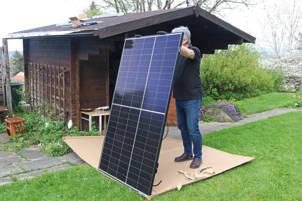 istock A man wants to mount a small solar system on a garden shed 1497728832