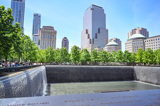 World Trade Center 9/11 memorial in New York City. Photographed on a clear sky summer day on 5/27/23