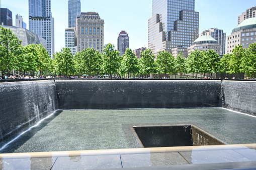 World Trade Center 9/11 memorial in New York City. Photographed on a clear sky summer day on 5/27/23