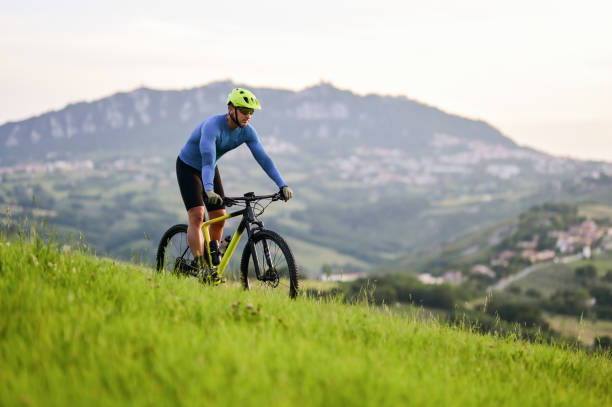 istock mountain biking during sunset in mountains. 1497730770
