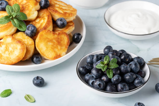 istock Homemade mini pancakes with blueberries 1497730831