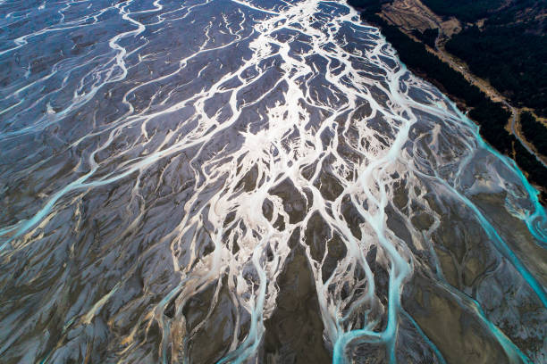Aerial perspective of river braid system from glacial runoff. Shot in New Zealand.