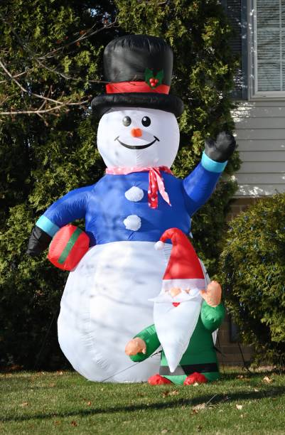 istock Inflated Snowman and Elf 1497736666
