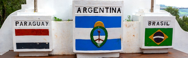 Argentina Brazil and Paraguay Country Symbols on Stone Monument