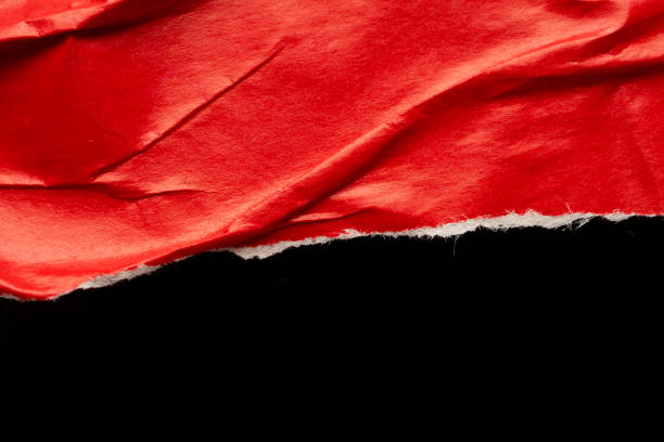 istock Red ripped paper torn edges strips isolated on black background 1497741968