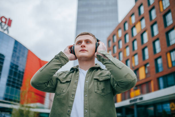 istock City Rhythms Handsome Man Relaxing with Headphones On 1497742129