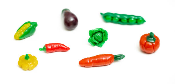 istock Colorful plasticine vegetable isolated on white background. Creative Handmade vegetables. 1497742189
