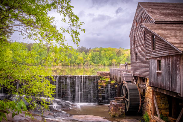 istock Millpond, waterfall, and gristmill at Historic Yates Mill County Park 1497743962