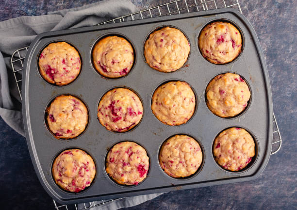 istock Freshly Baked Raspberry Muffins in a Nonstick Muffin Pan 1497744289