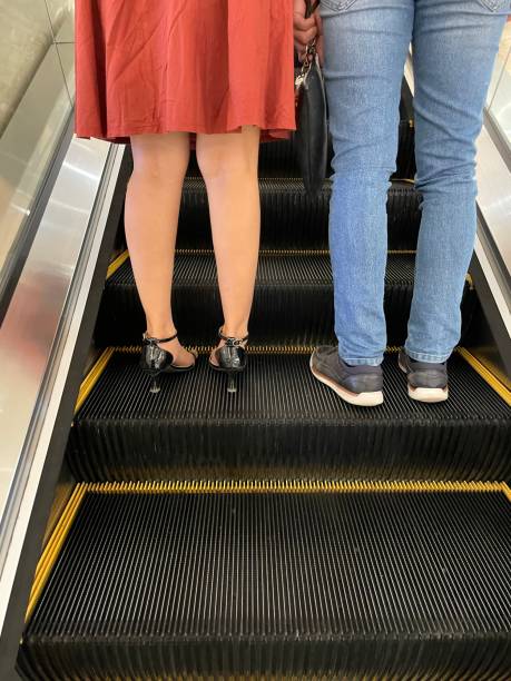 istock Love couple is on the escalator 1497752860