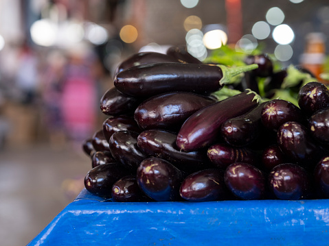 fresh eggplants at the local market