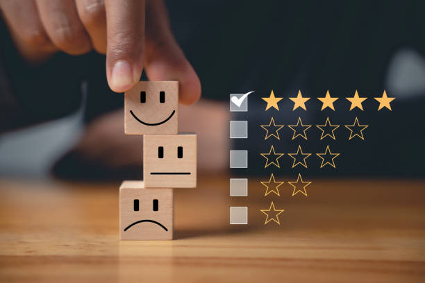istock 5-star satisfaction is guaranteed with a smiley face selected by a businessman 1497760381