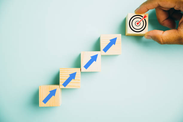 istock Wooden blocks with Target icon on top 1497760399