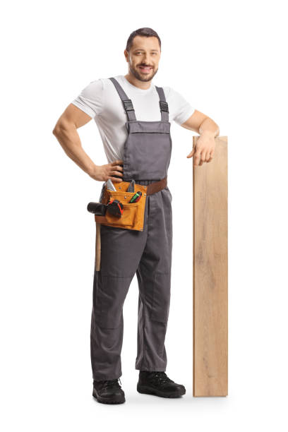 istock Craftsman posing with a wooden floor beam 1497761038