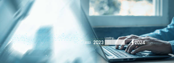 istock Countdown to 2024 concept. the taps a virtual download bar with a loading progress meter on New Year's Eve, turning the year 2023 to 2024. 1497776311