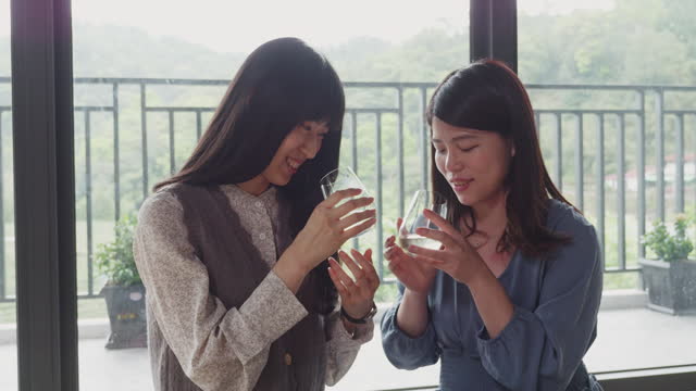 Visitors savoring the essence of Baozhong tea in a Japanese tea room