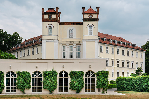 ‎⁨Lübbenau⁩, ⁨Brandenburg⁩, ⁨Germany⁩. May 08, 2023. A palace in the center of a city park. Sprewald district - Eastern Germany