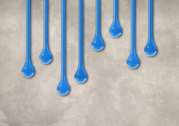 istock Blue ink drops on light concrete wall. Horizontal wallpaper 1497784453