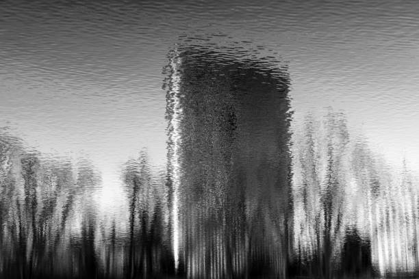 istock Abstract reflections of building in a lake 1497785562