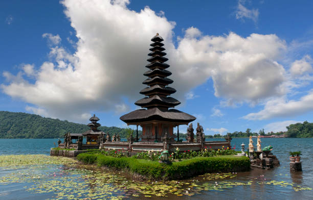 Trip to Bali. Pura Ulun Danu temple on lake Brataan. (Island Bali, Indonesia) Trip to Bali. Pura Ulun Danu temple on lake Brataan. (Island Bali, Indonesia) floating temple in lake bedugul bali stock pictures, royalty-free photos & images