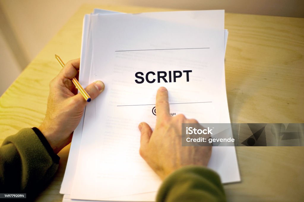 Screen Writer Interviewing With Hard Copy Script Stock Photo - Download ...