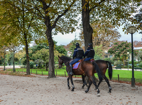 Paris, France - Oct 3, 2018. Gendarmes on horseback in Paris, France. The National Gendarmerie is one of two national police forces of France.