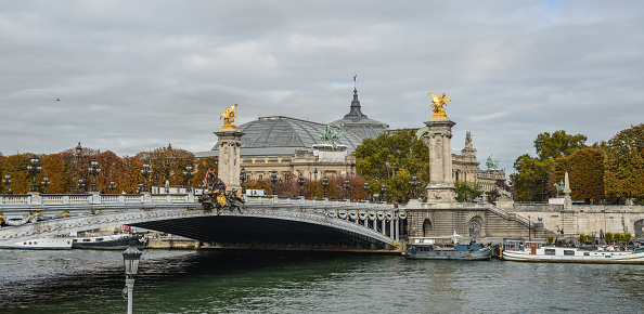 Paris, France - Oct 3, 2018. Historical architecture and River Seine in Paris, France. The Seine River runs through Paris and is central to its history.